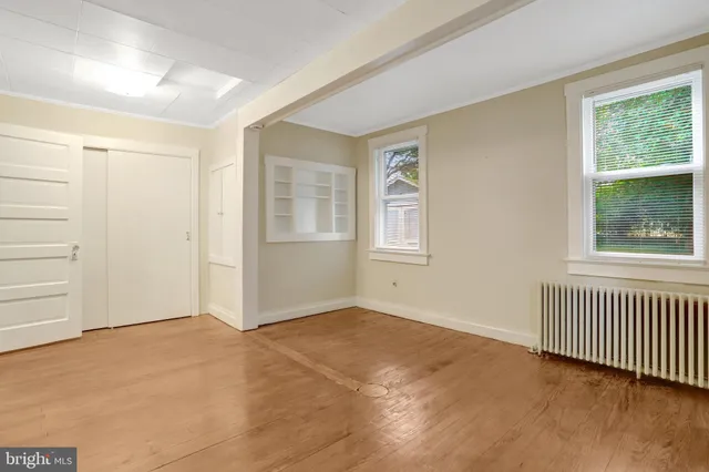 an empty room with windows