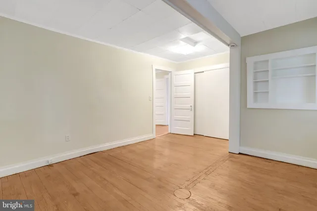 an empty room with an entryway