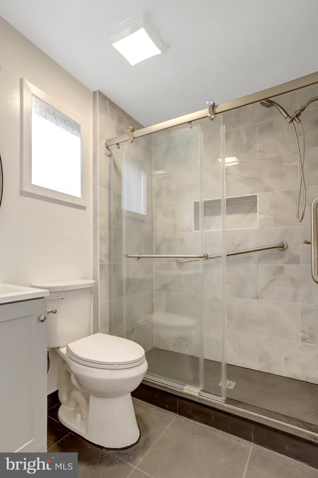 2621 2nd Road North Arlington, VA 22201 - Photo 20 of 44 a bathroom with a toilet and a shower
