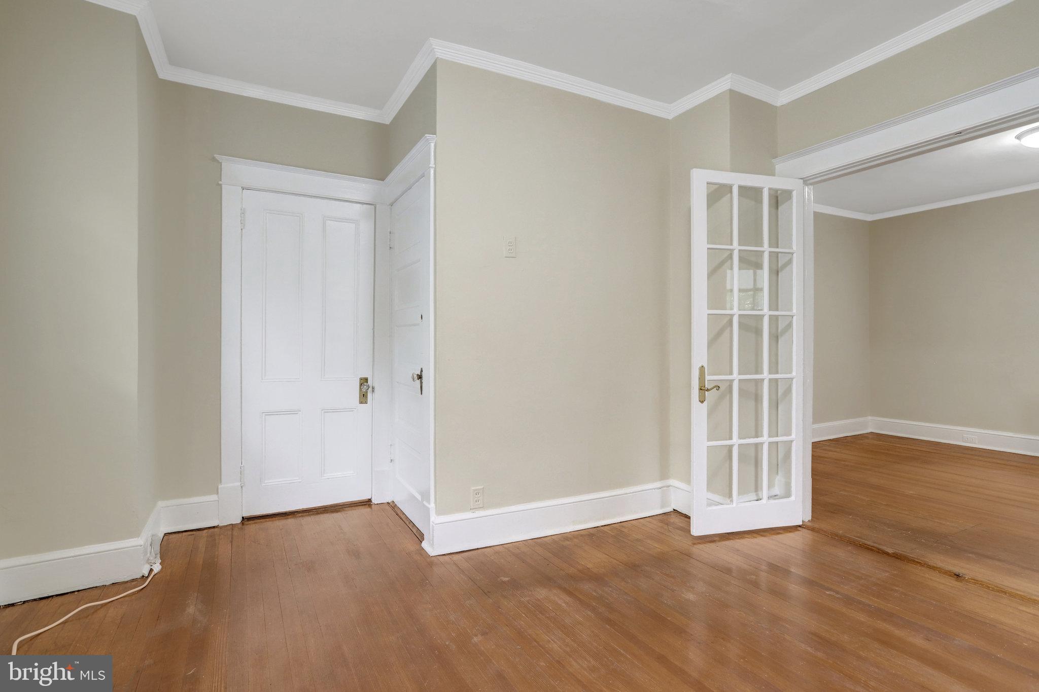 2621 2nd Road North Arlington, VA 22201 - Photo 21 of 44 a view of an empty room with wooden floor and a window