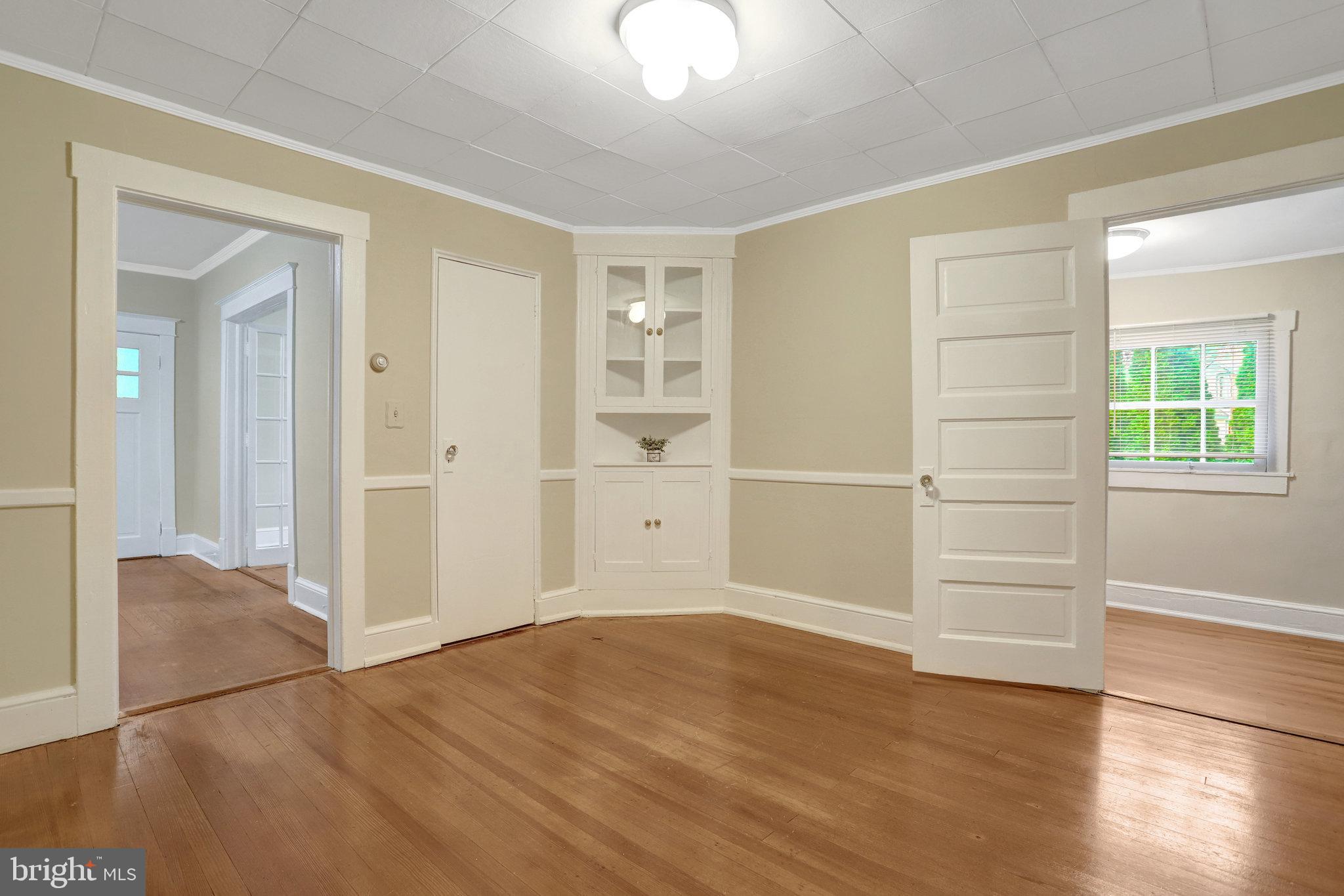 2621 2nd Road North Arlington, VA 22201 - Photo 25 of 44 an empty room with wooden floor and windows