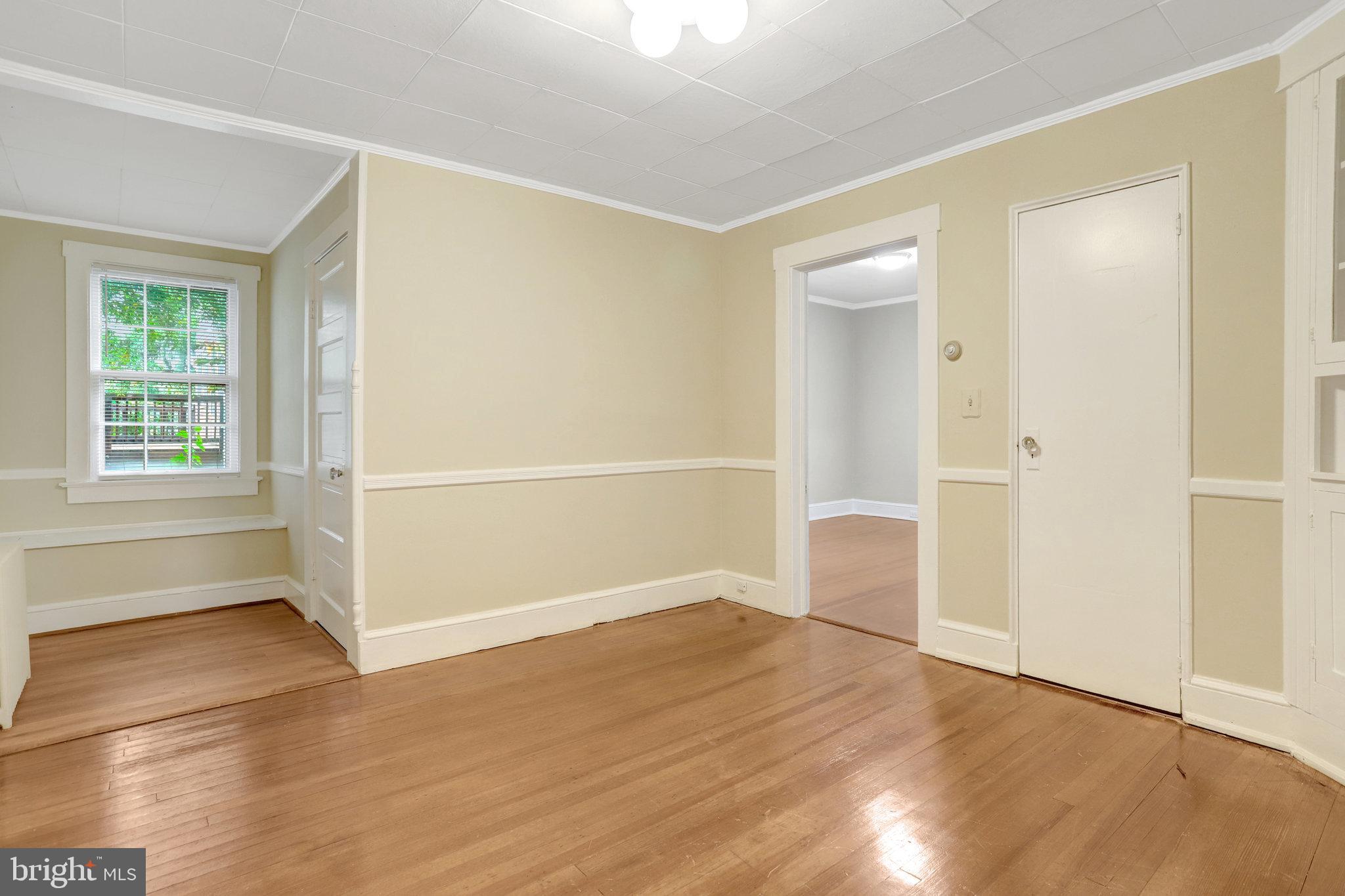 2621 2nd Road North Arlington, VA 22201 - Photo 27 of 44 an empty room with wooden floor and windows