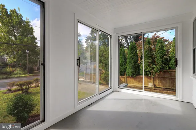 a view of a room with a large window
