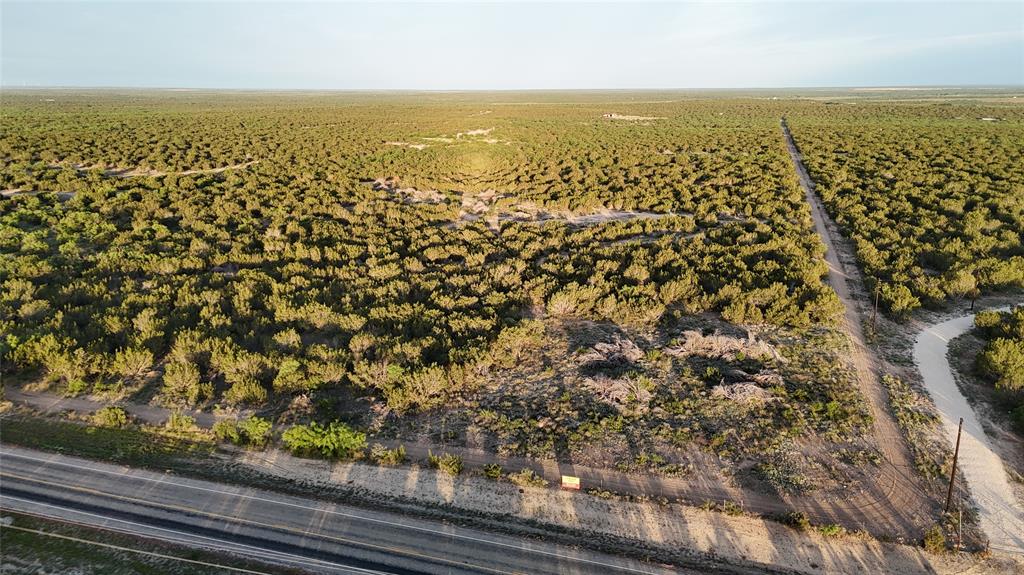 4 Rr 11 Millersview, TX 76862 - Photo 2 of 34 an aerial view of residential houses with outdoor space and trees
