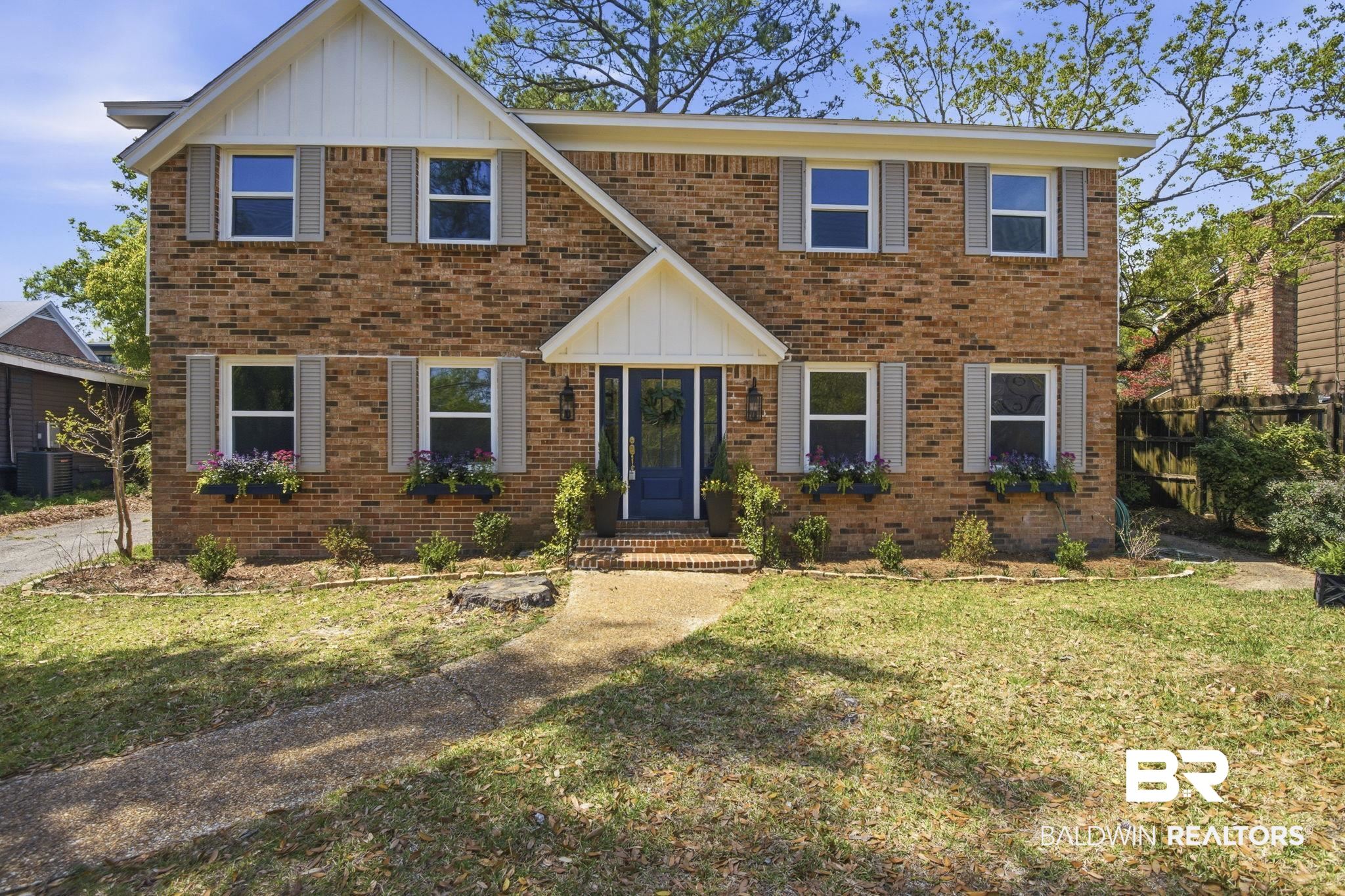 511 Wacker Lane North Mobile, AL 36608 - Photo 41 of 45 View of front of house with board and batten siding and brick siding