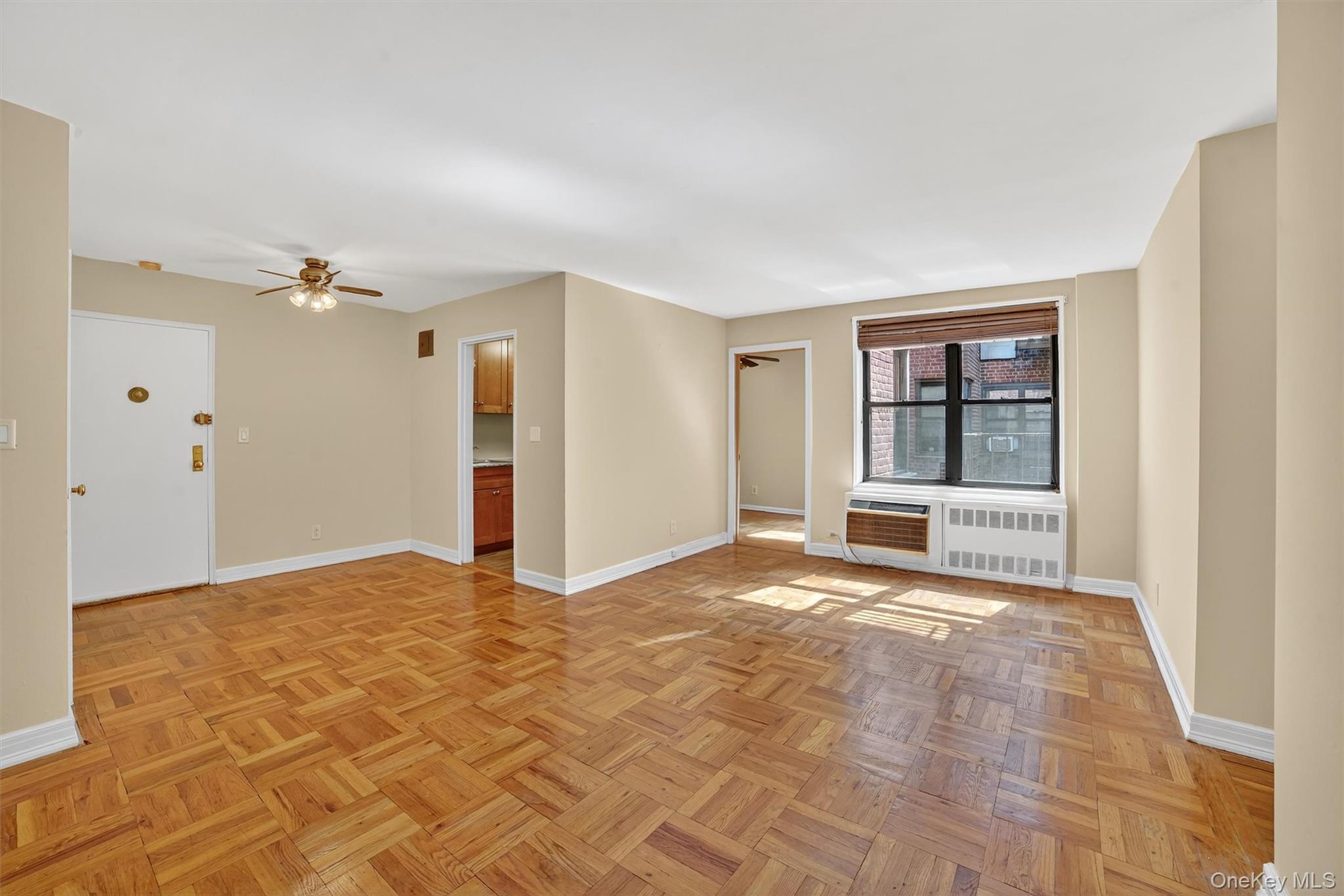 277 Bronx River Road, Unit 5M Yonkers, NY 10704 - Photo 5 of 20 a view of a big room with closet and mirror