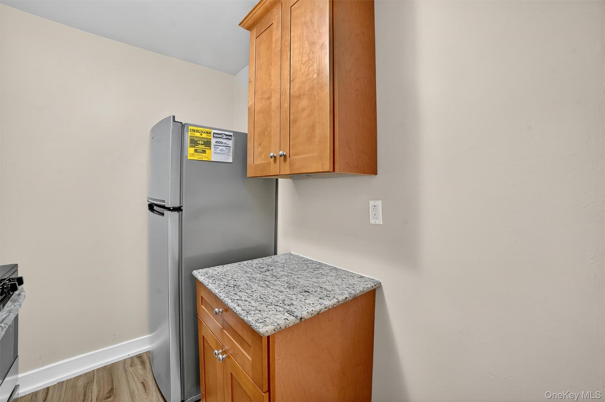 277 Bronx River Road, Unit 5M Yonkers, NY 10704 - Photo 10 of 20 a bathroom with a granite countertop sink and a mirror