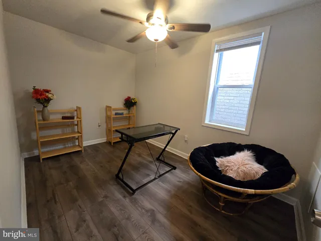 a room with furniture and a chandelier