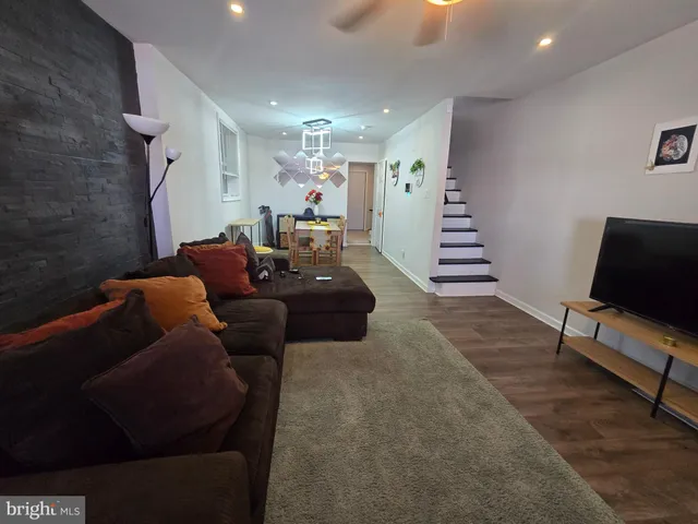 a living room with furniture and a couch
