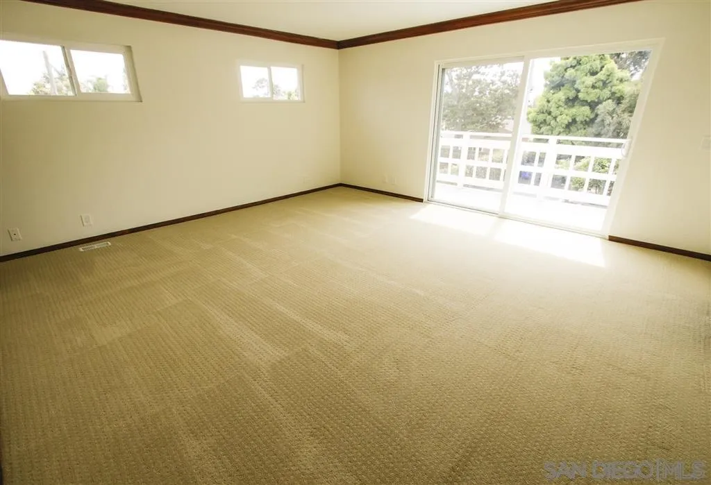 1062 Golden Road Encinitas, CA 92024 - Photo 5 of 16 a view of an empty room with a window