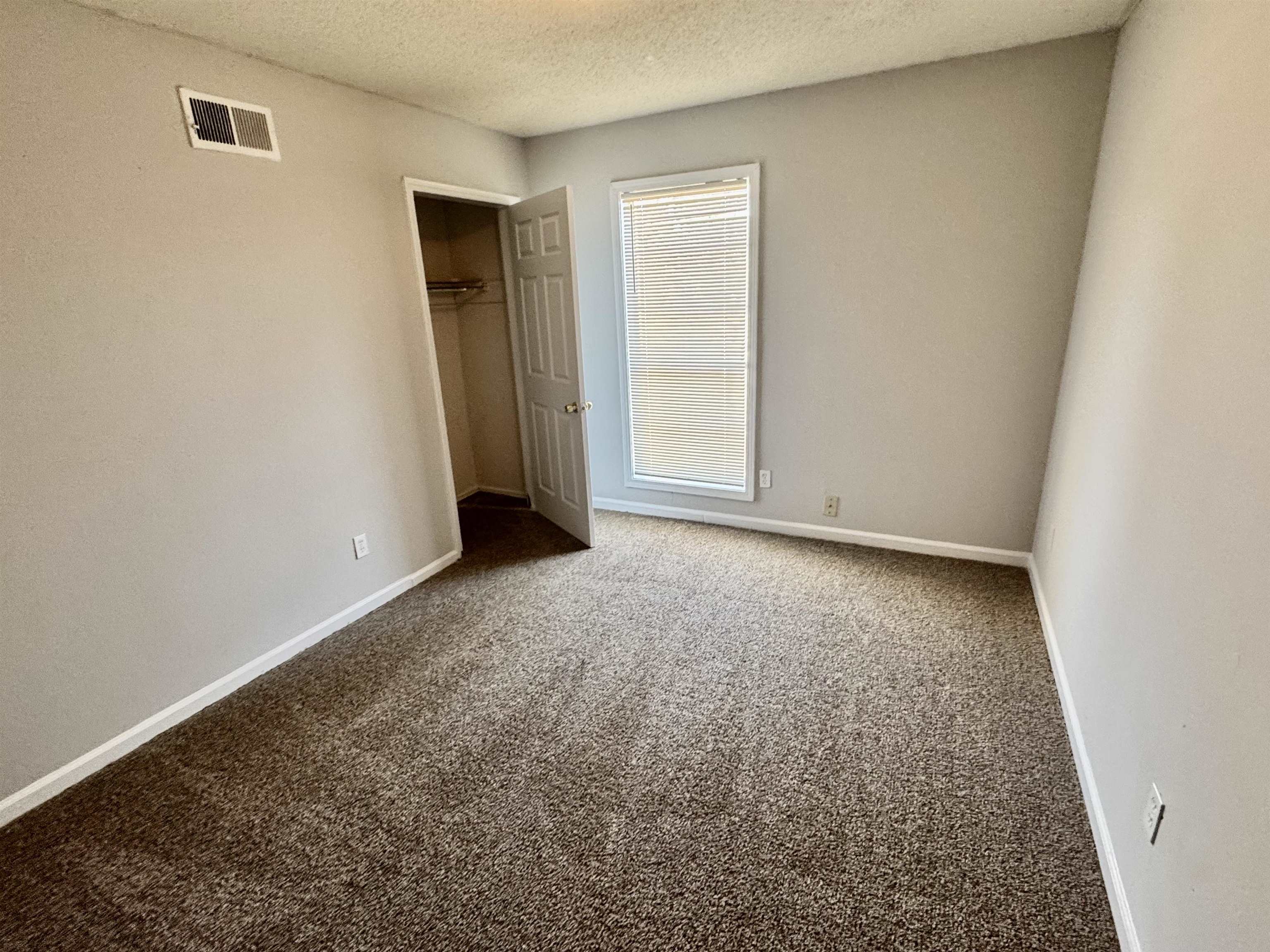 4057 Windermere Road Memphis, TN 38128 - Photo 11 of 14 an empty room with closet