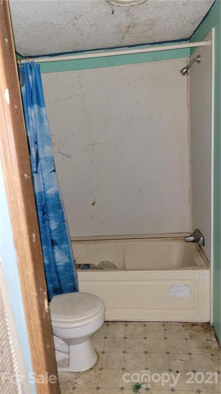 843 Archie Street Fort Mill, SC 29715 - Photo 14 of 18 a bathroom with a shower and a toilet