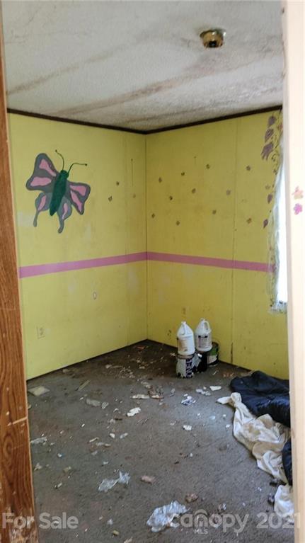 843 Archie Street Fort Mill, SC 29715 - Photo 15 of 18 a room with a wooden floor and a table