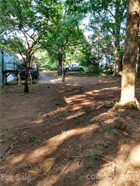 843 Archie Street Fort Mill, SC 29715 - Photo 17 of 18 a view of road with trees