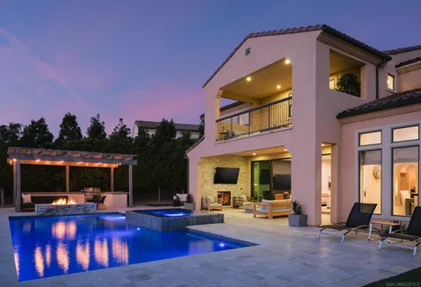 a view of swimming pool with seating area and hardwood floor