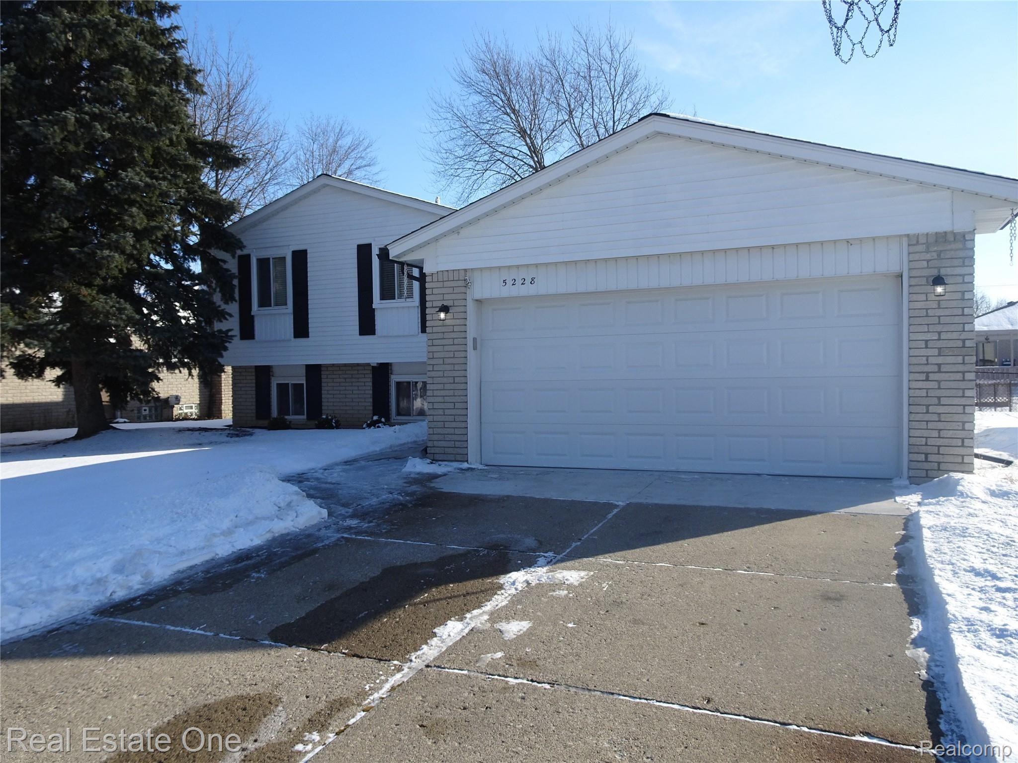 5228 Peekskill Drive Sterling Heights, MI 48310 - Photo 1 of 28 Front Elevation