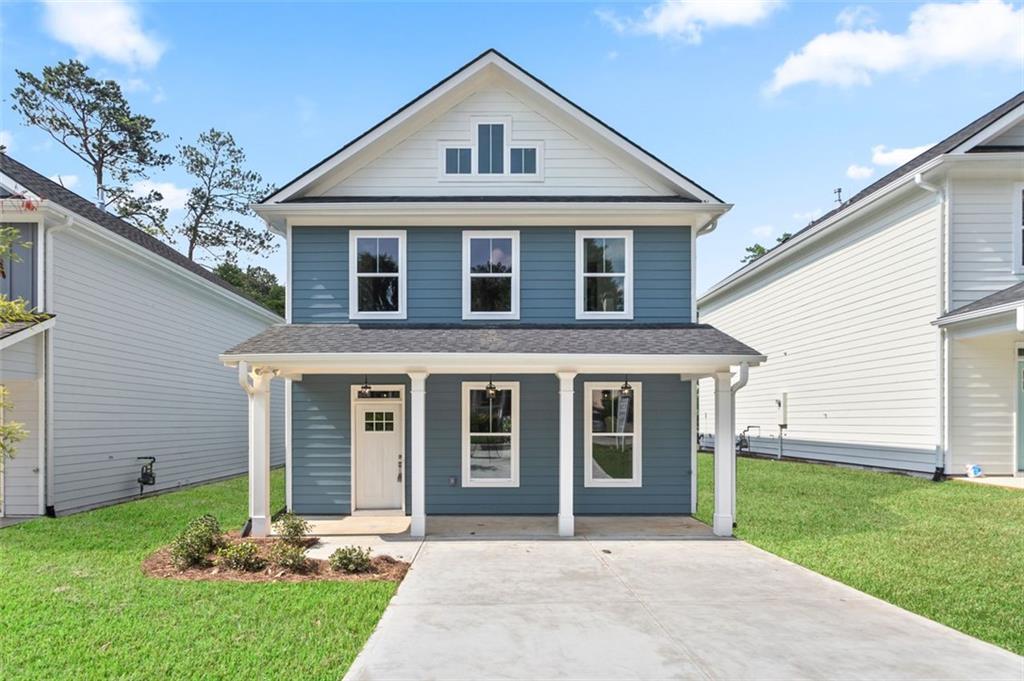 2812 Lincoln Drive Decatur, GA 30033 - Photo 1 of 1 a front view of a house with garden