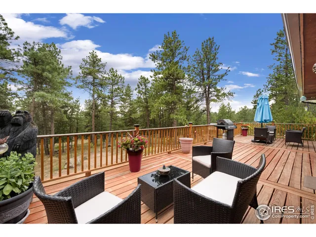 a view of balcony with furniture