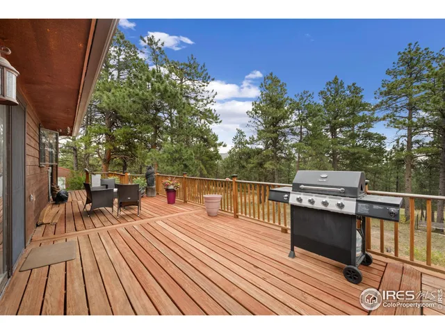 a view of a balcony with chairs