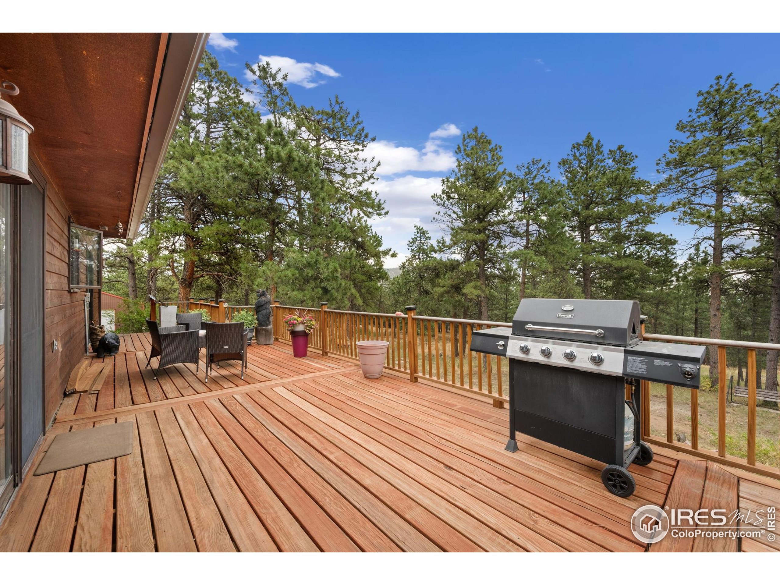 269 Cox Court Bellvue, CO 80512 - Photo 18 of 47 a view of a balcony with chairs