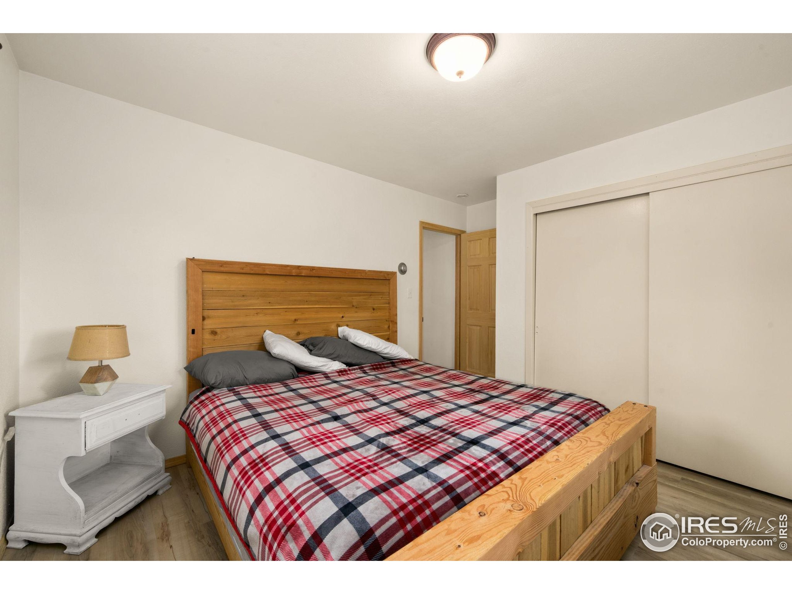 269 Cox Court Bellvue, CO 80512 - Photo 23 of 47 a bedroom with a bed and a window