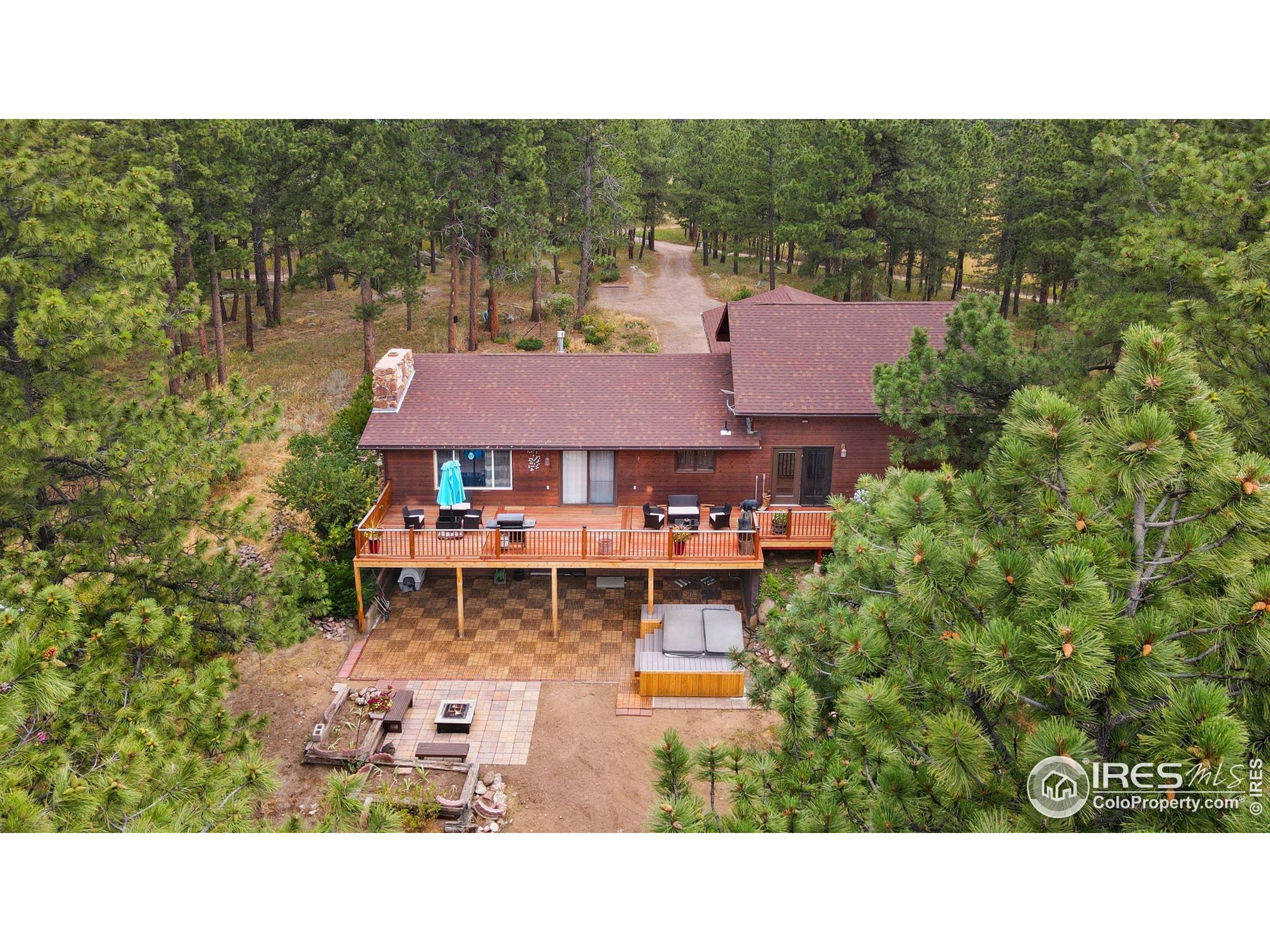 269 Cox Court Bellvue, CO 80512 - Photo 36 of 47 a aerial view of a house with a garden