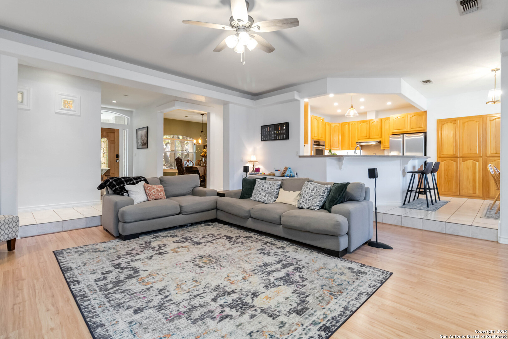 339 Long Meadow Spring Branch, TX 78070 - Photo 11 of 53 a living room with furniture and a flat screen tv