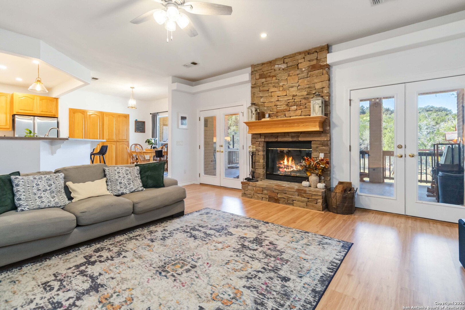 339 Long Meadow Spring Branch, TX 78070 - Photo 12 of 53 a living room with furniture and a fireplace