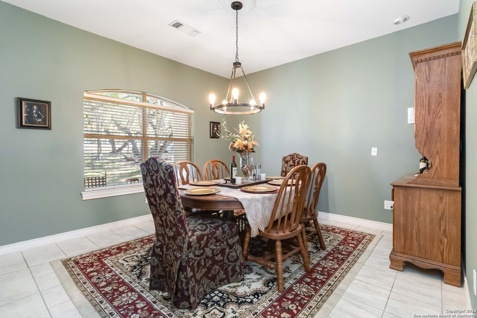 339 Long Meadow Spring Branch, TX 78070 - Photo 14 of 53 a dining room with furniture a rug and wooden floor