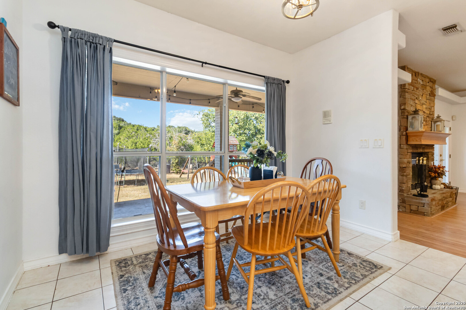339 Long Meadow Spring Branch, TX 78070 - Photo 22 of 53 a view of a dining room with furniture window and outside view