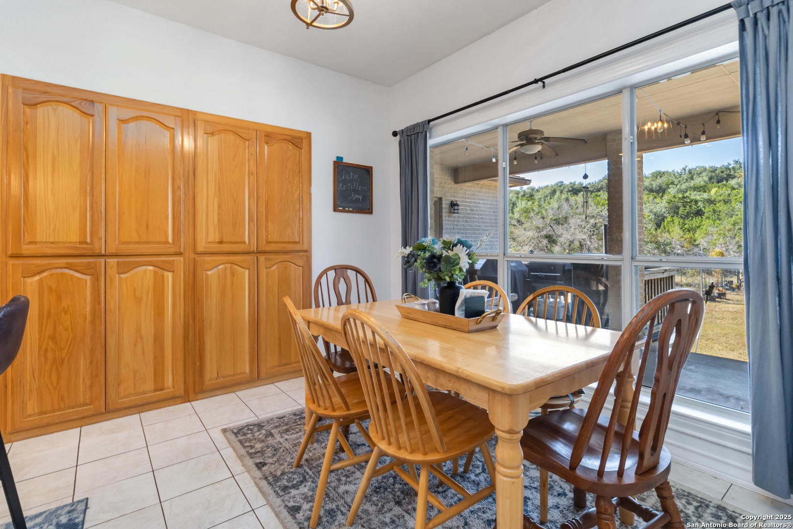 339 Long Meadow Spring Branch, TX 78070 - Photo 23 of 53 a view of a dining room with furniture window and outside view