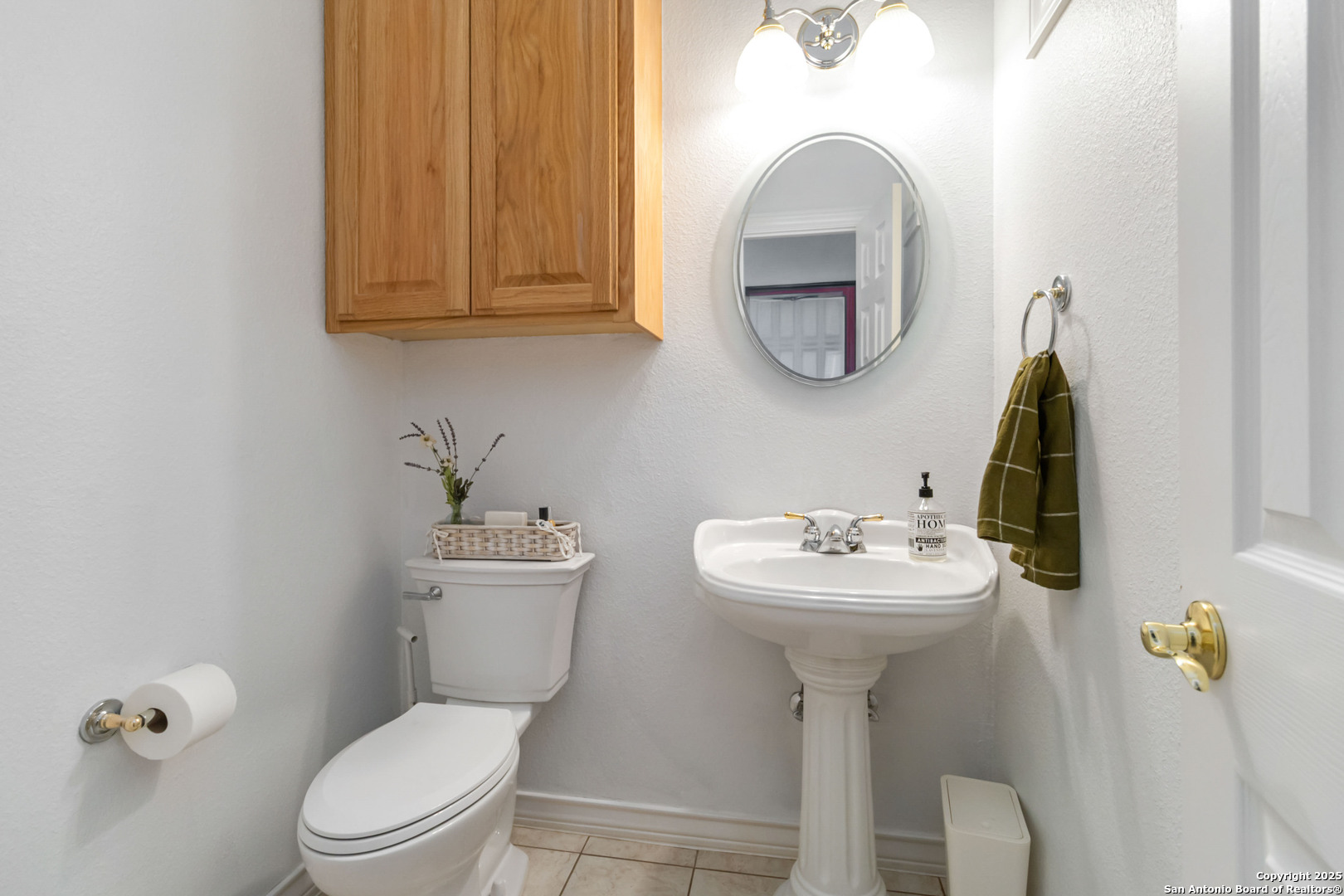 339 Long Meadow Spring Branch, TX 78070 - Photo 24 of 53 a bathroom with a toilet sink and mirror