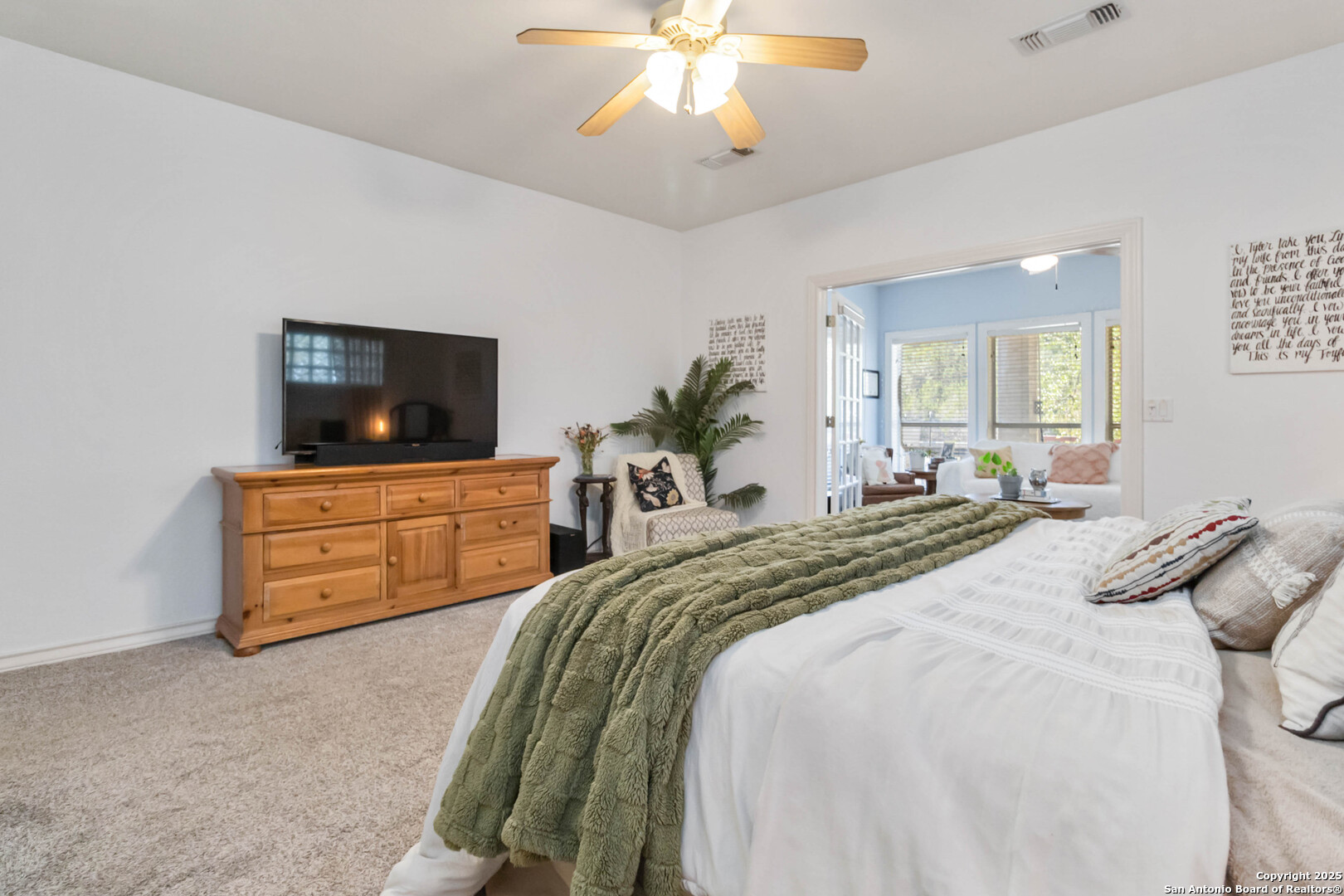 339 Long Meadow Spring Branch, TX 78070 - Photo 28 of 53 a bedroom with a bed and wooden floor