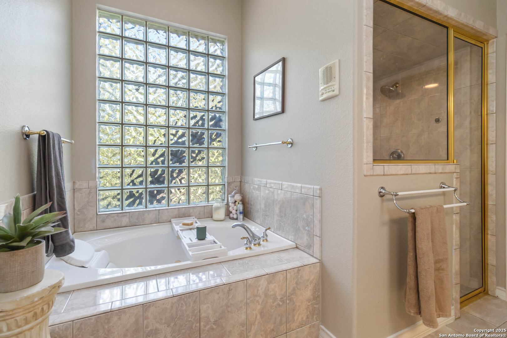 339 Long Meadow Spring Branch, TX 78070 - Photo 32 of 53 a bathroom with a tub sink and mirror