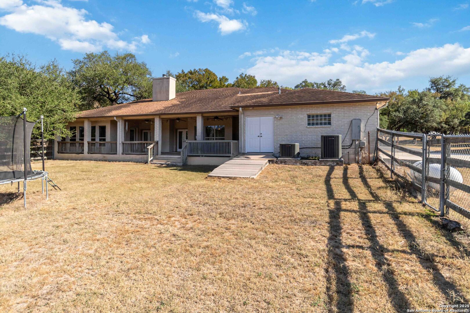 339 Long Meadow Spring Branch, TX 78070 - Photo 45 of 53 a view of a house with yard and sitting area
