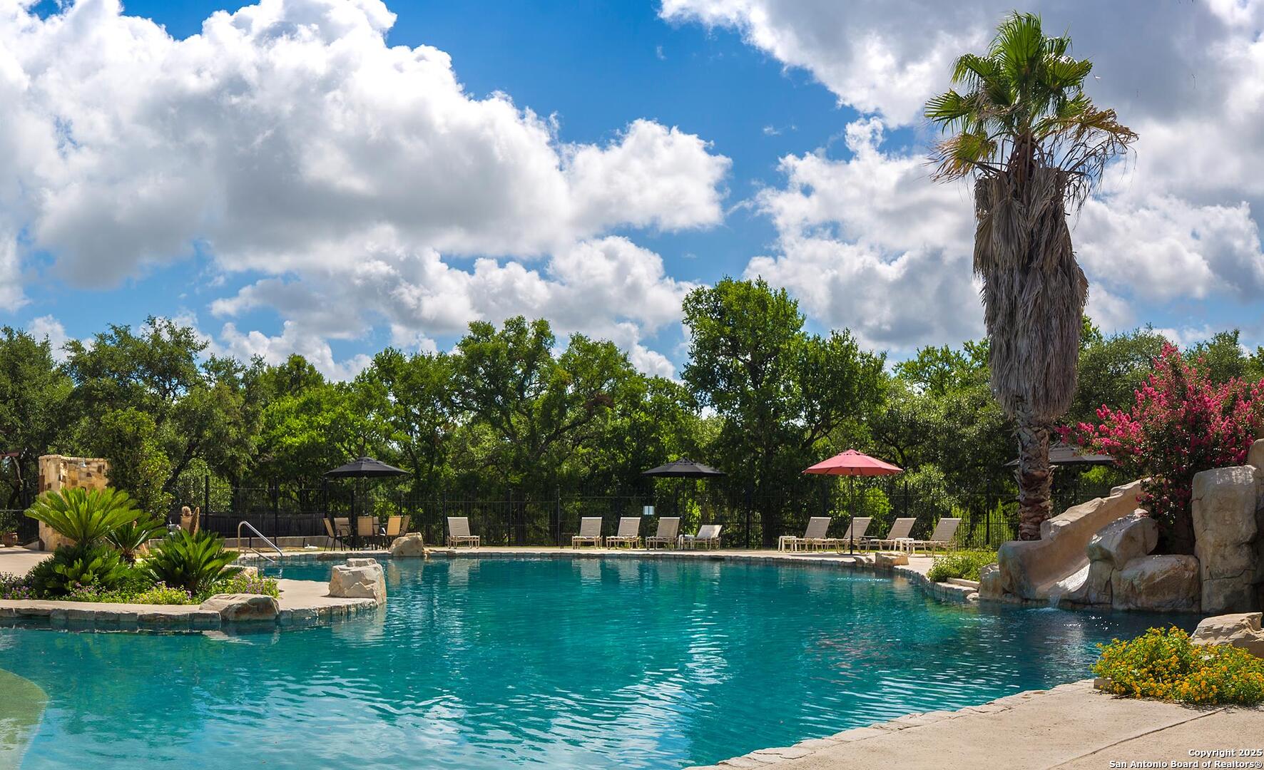 339 Long Meadow Spring Branch, TX 78070 - Photo 49 of 53 a view of a lake with a house in the background