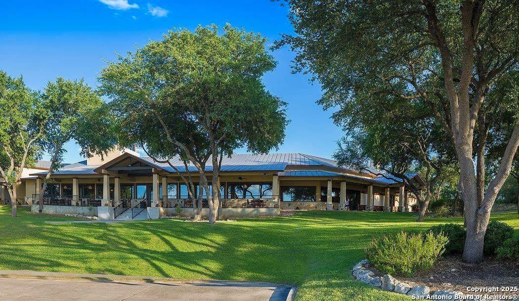 339 Long Meadow Spring Branch, TX 78070 - Photo 52 of 53 a front view of a house with garden