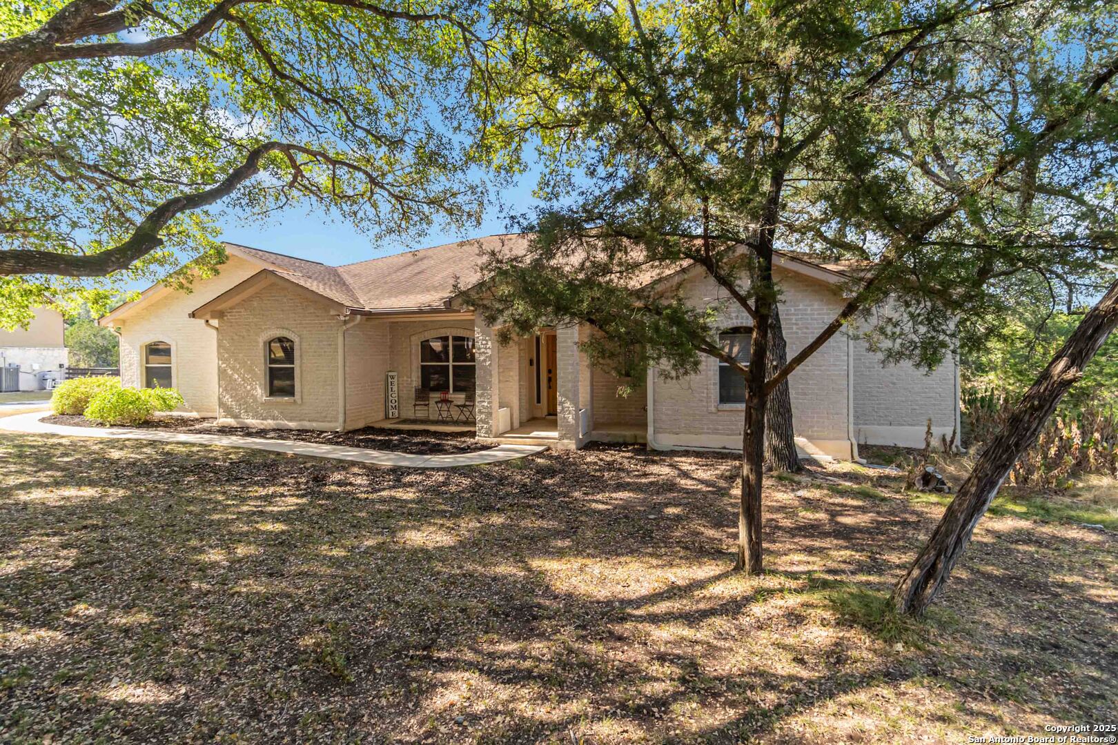 339 Long Meadow Spring Branch, TX 78070 - Photo 7 of 53 a view of a house with a yard