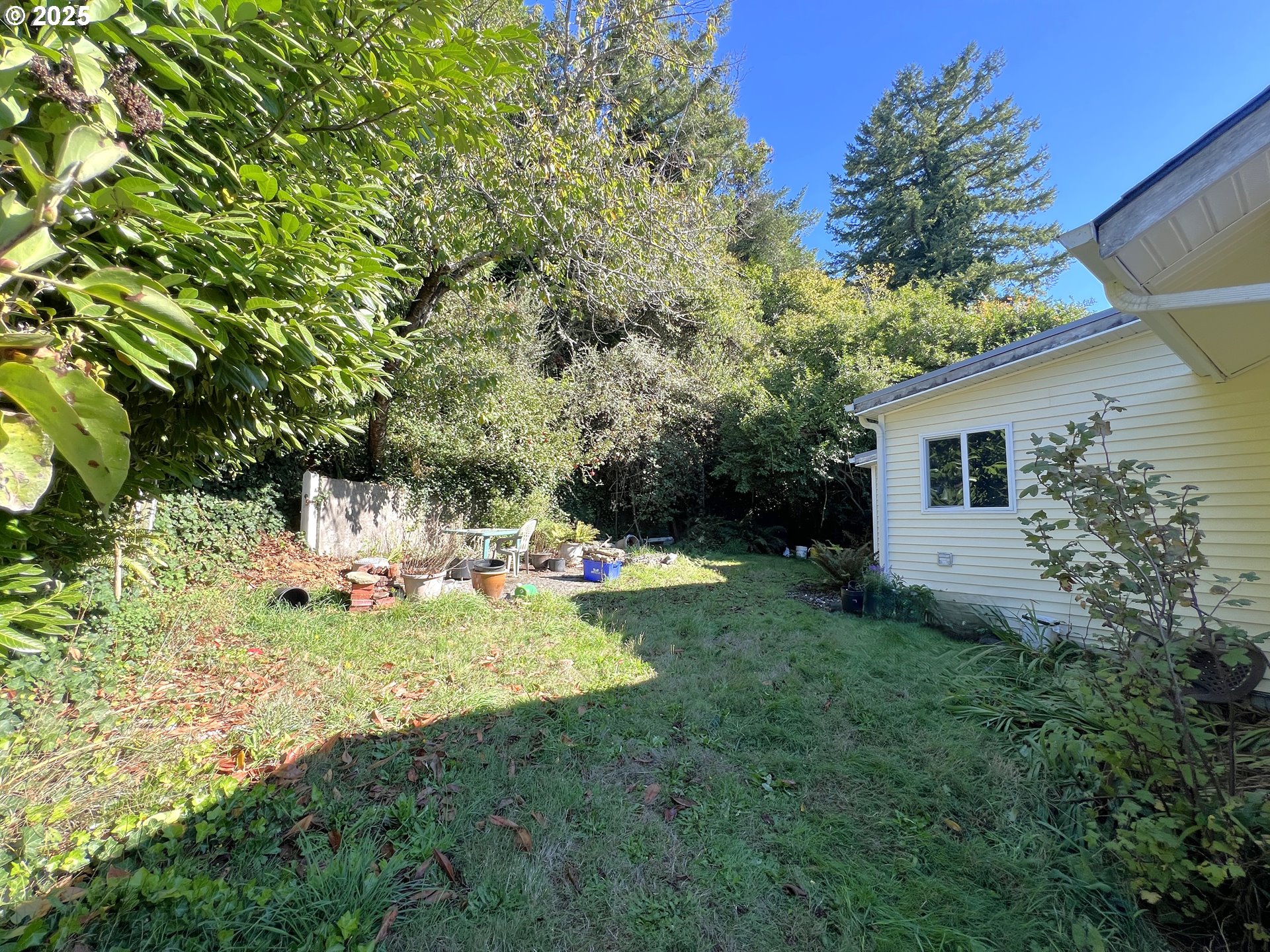 860 8th Terrace Coos Bay, OR 97420 - Photo 20 of 22 a fire hydrant in the middle of a field