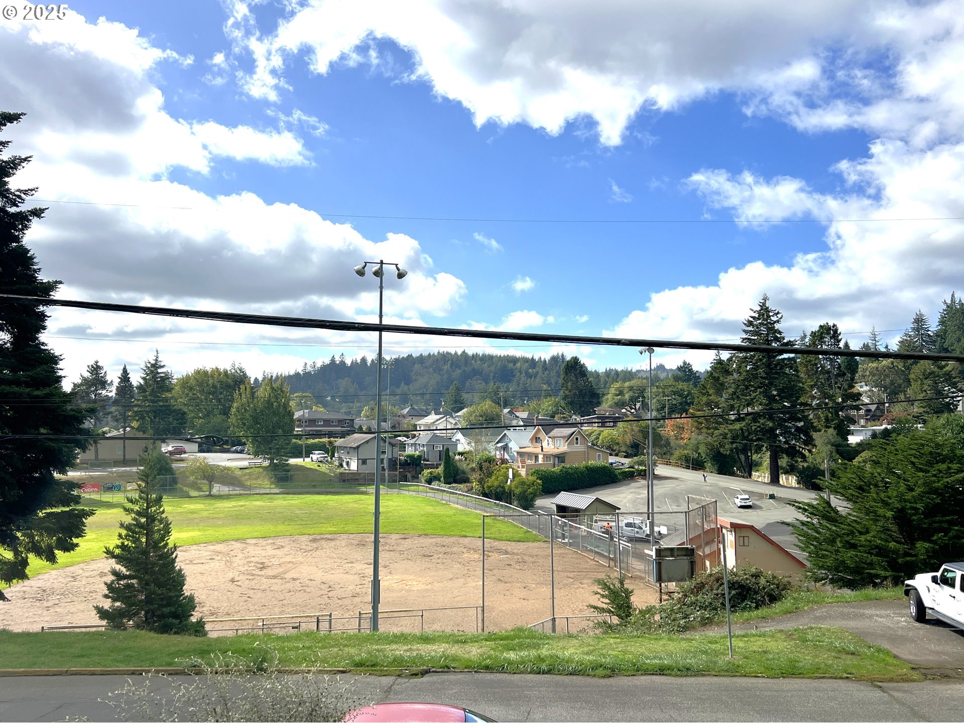 860 8th Terrace Coos Bay, OR 97420 - Photo 5 of 22 a view of a swimming pool and a yard