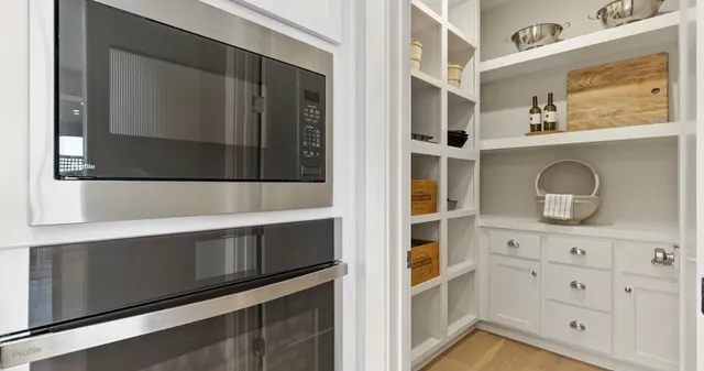 a view of entryway with wooden floor and stairs