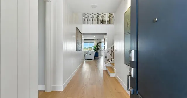 a living room with furniture and a rug