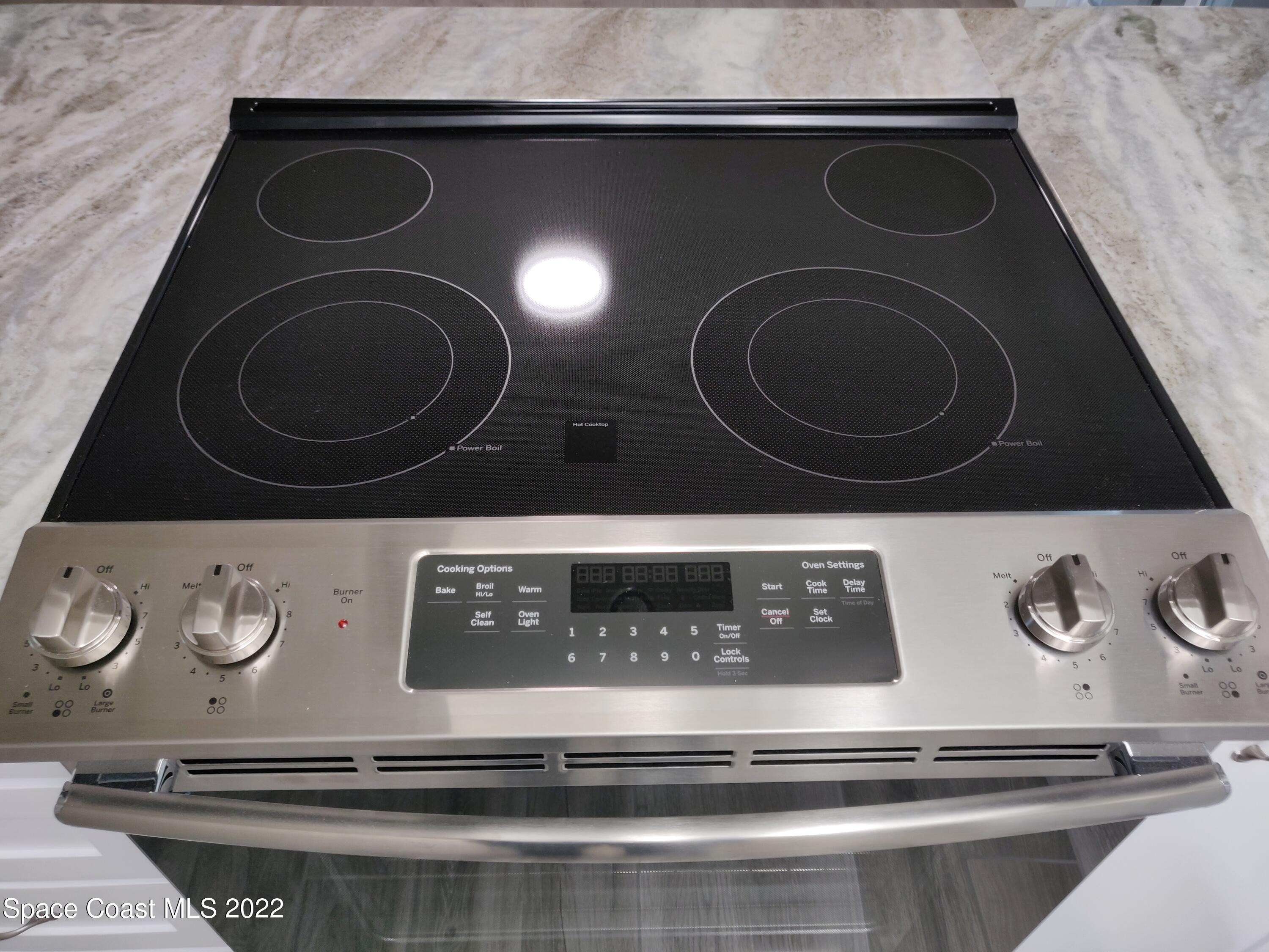 3649 Longbow Road Cocoa, FL 32926 - Photo 20 of 34 a close view of stove
