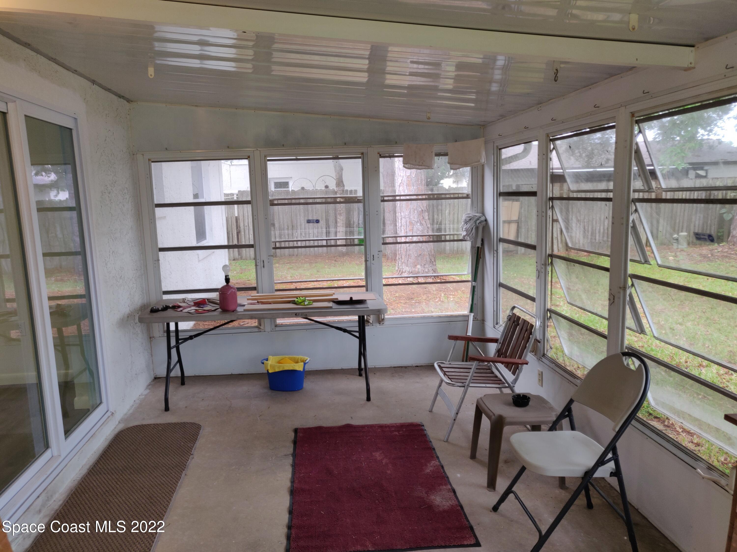3649 Longbow Road Cocoa, FL 32926 - Photo 22 of 34 a living room with furniture