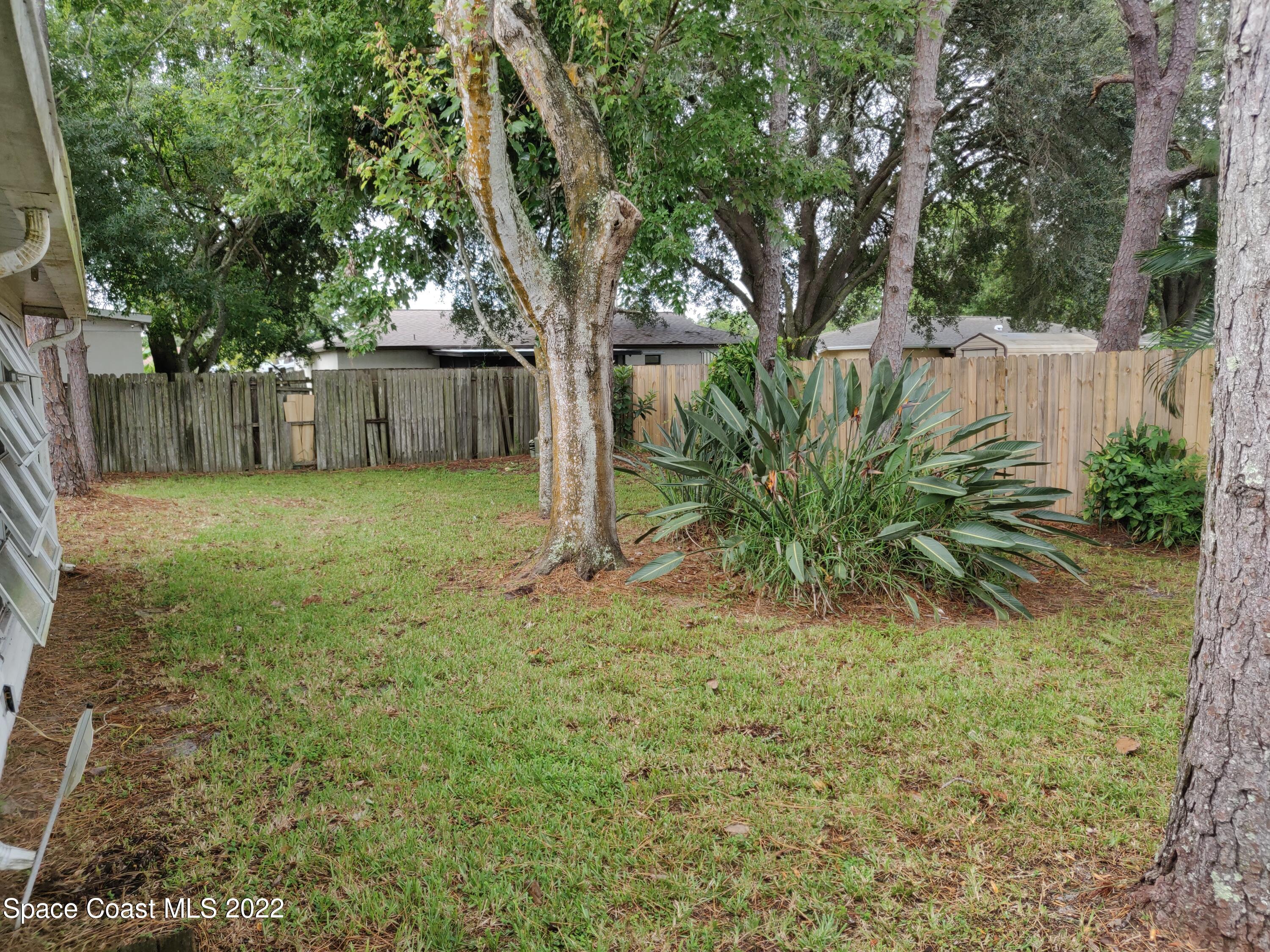 3649 Longbow Road Cocoa, FL 32926 - Photo 28 of 34 a view of a backyard