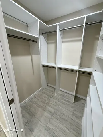 a view of a storage & utility room with a sink