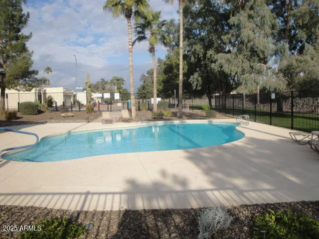 a view of yard with grass and trees