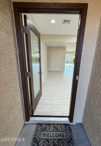 a view of hallway with stairs