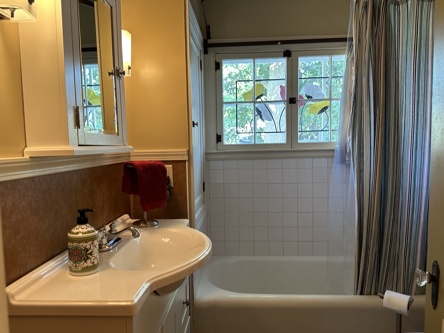 15445 Lincoln Road Morrison, IL 61270 - Photo 13 of 29 a bathroom with a sink a bathtub and a window