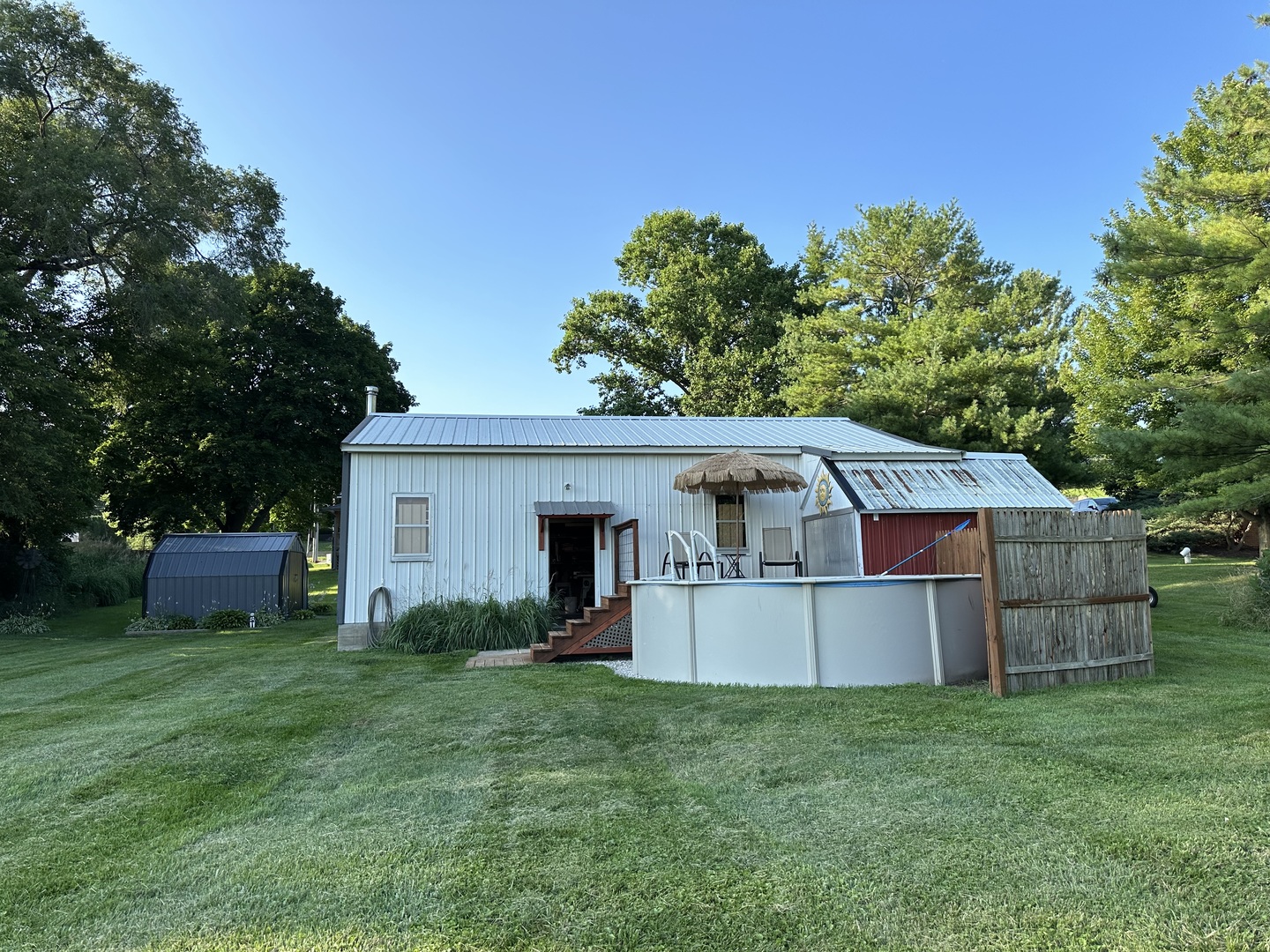 15445 Lincoln Road Morrison, IL 61270 - Photo 21 of 29 a view of a house with backyard and sitting area